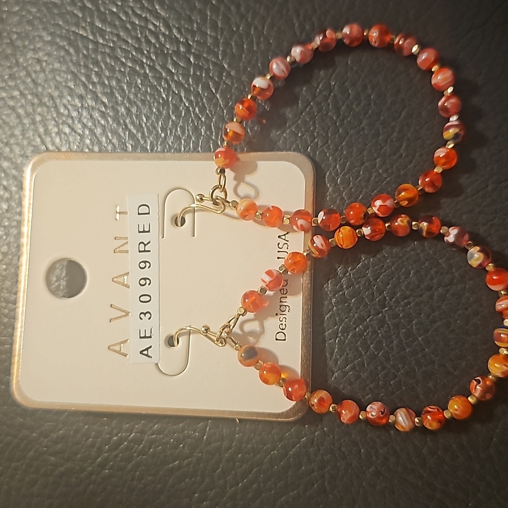 Red and gold hoop earrings